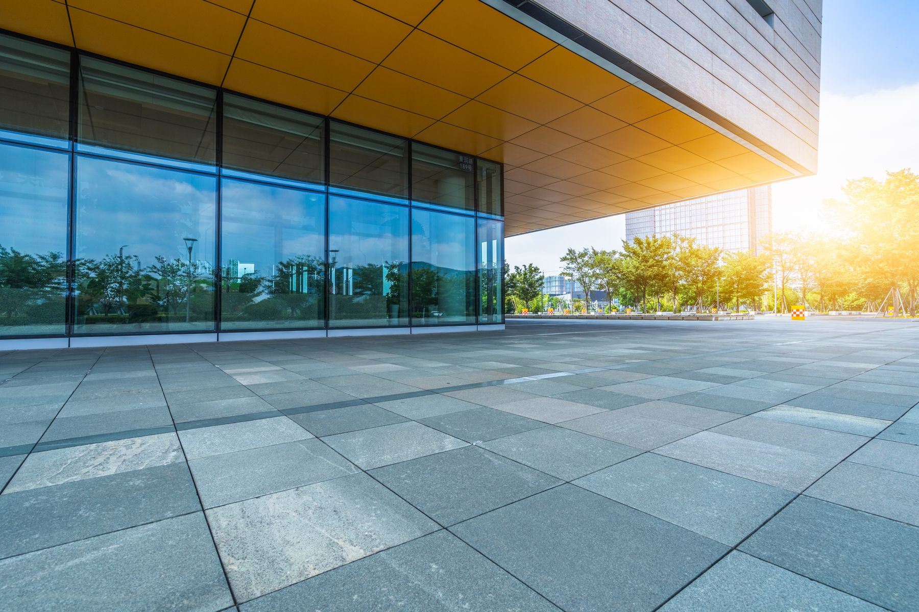 Renovated glass storefront and entrance facade