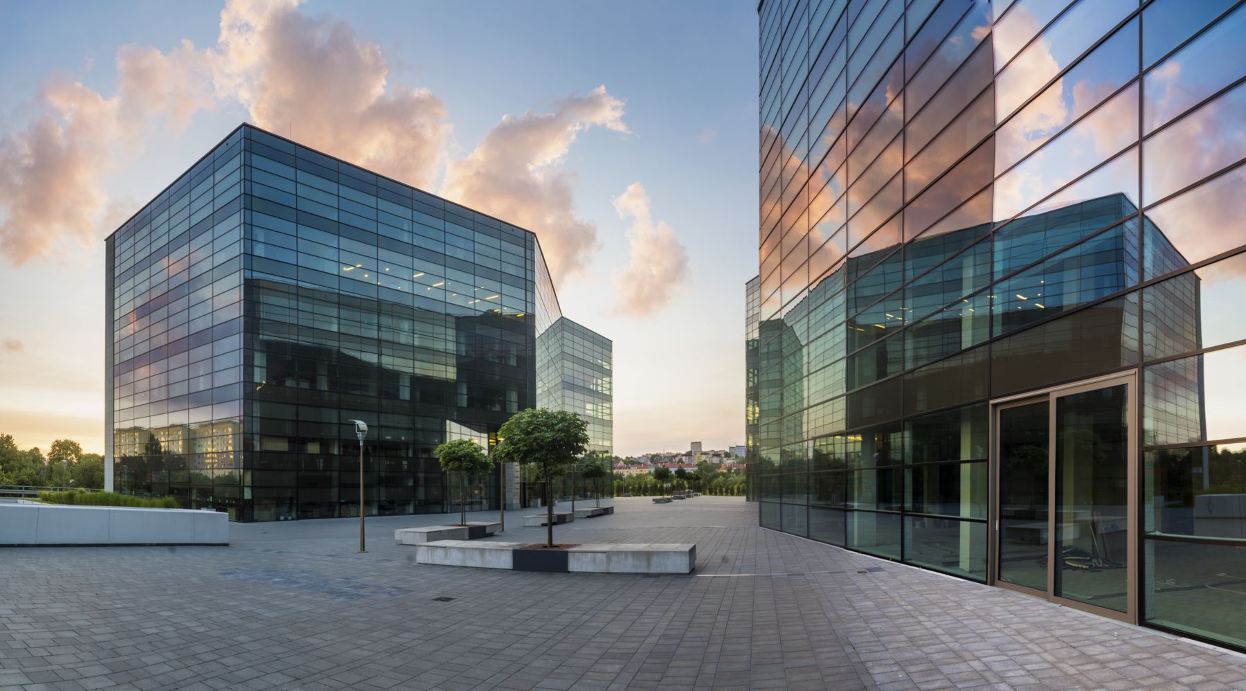 Glass curtain wall facades on modern office towers
